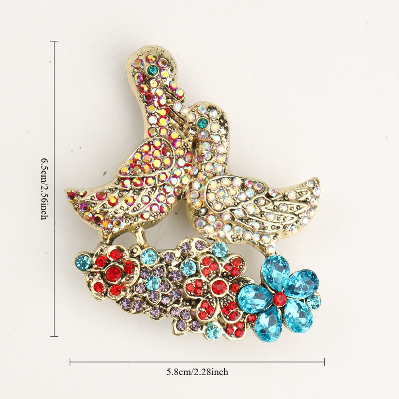 Elegant Mandarin Duck Brooch Pin with Rhinestones and Floral Accents Jewelry