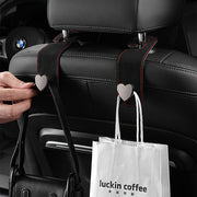 Gancho oculto en la parte trasera del asiento del coche para colgar objetos pequeños, de cuero PU, con almacenamiento en aleación de metal