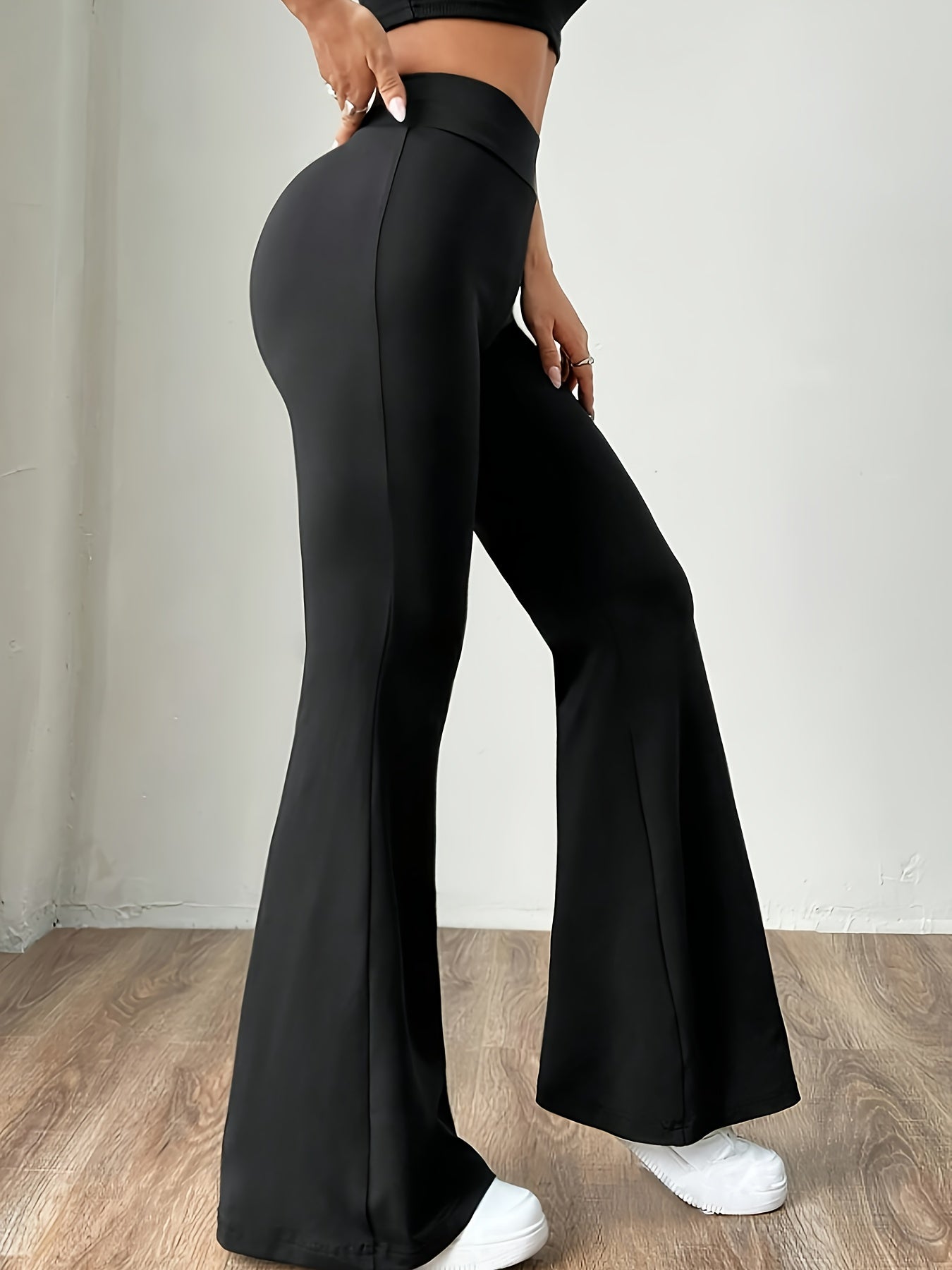 Pantalones de pierna acampanada de tiro alto para mujer con tela de punto elástico y control de abdomen