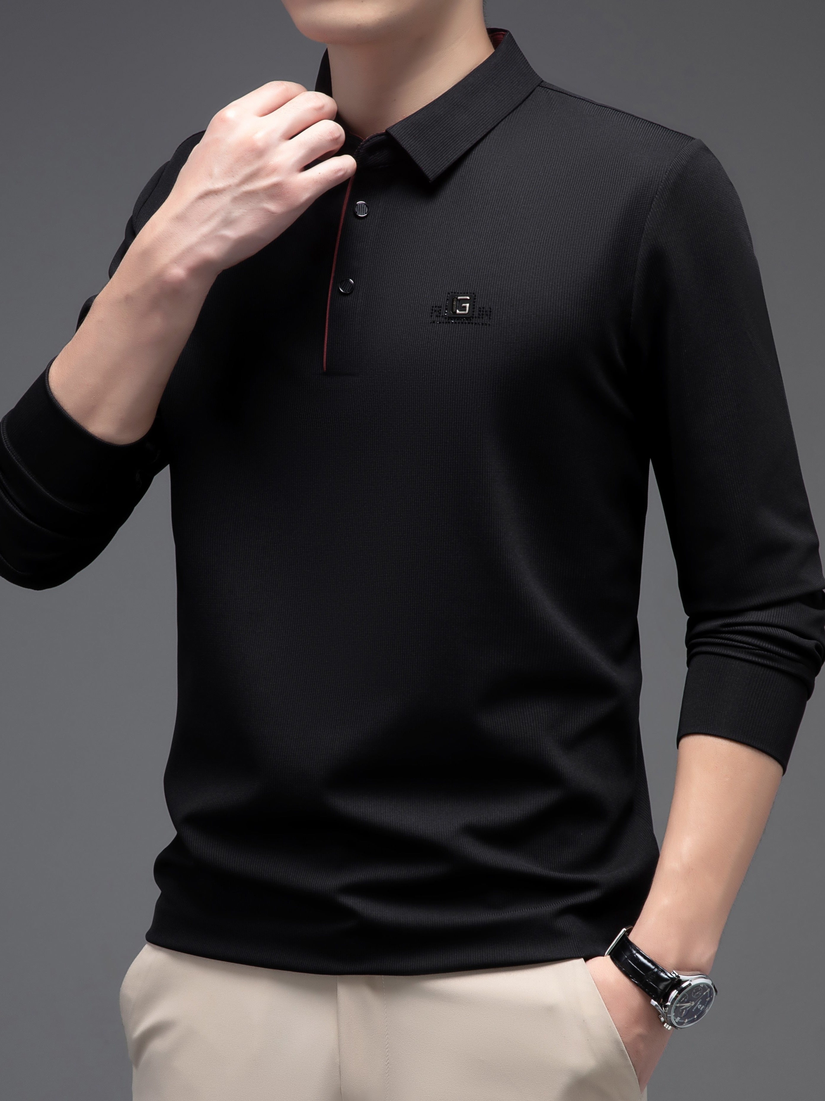 Camisa de manga larga de color sólido para hombre con botones, cuello de solapa y detalles con logotipo