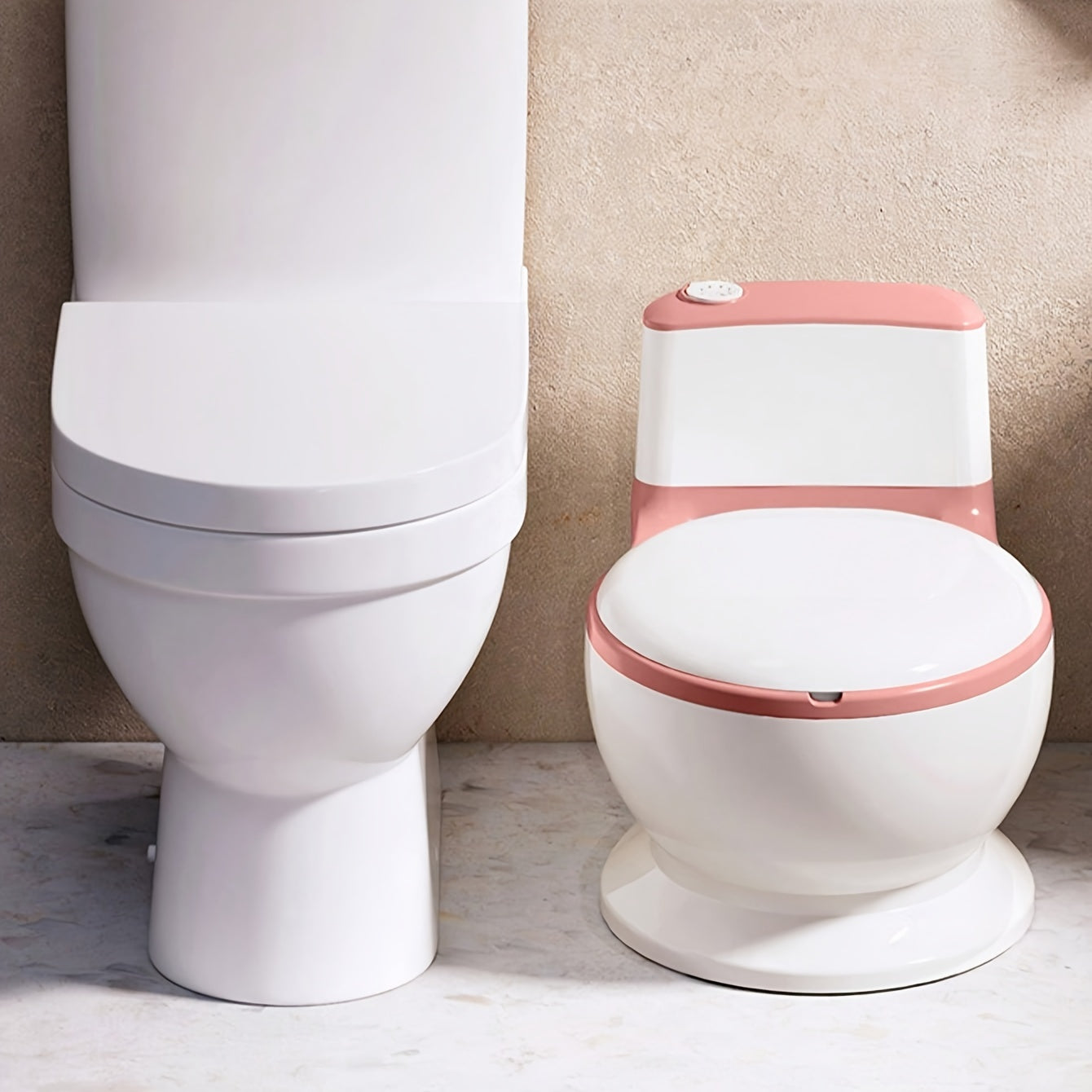 Katta o'lchamdagi bolalar uchun potty o'qitish tualet o'rindig'i aralash ranglarda, kichkintoylar uchun ideal. Plastik materialdan tayyorlangan.