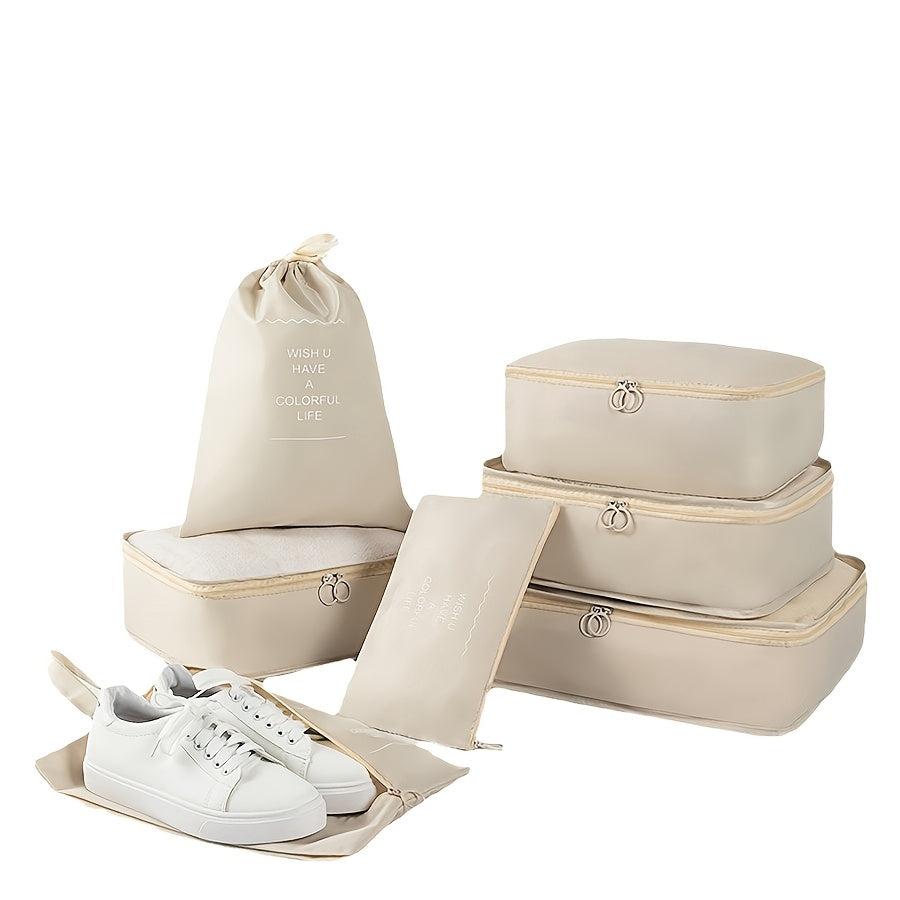 Katta sig'imli nylon sayohat tashkilotchisi to'plami bej va qora rangda, kiyim, poyabzal va paypoqlarni saqlash uchun 7 dona o'z ichiga oladi. Zipper yopilishi, tutqichlar va ko'chma xususiyatlariga ega.