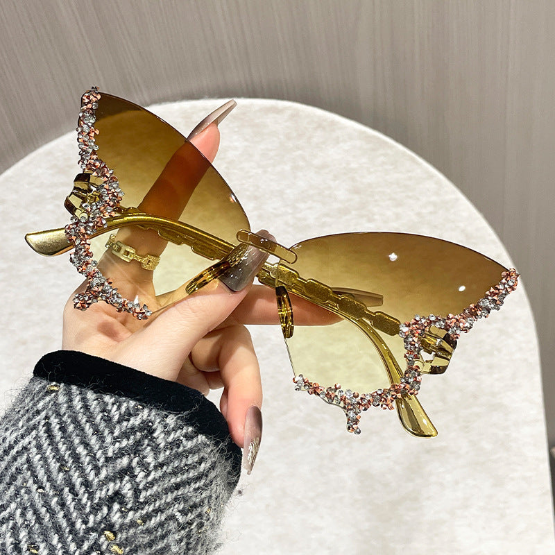 Women's Butterfly-Shaped Rimless Glasses with Rhinestone Accents and Polycarbonate Lenses
