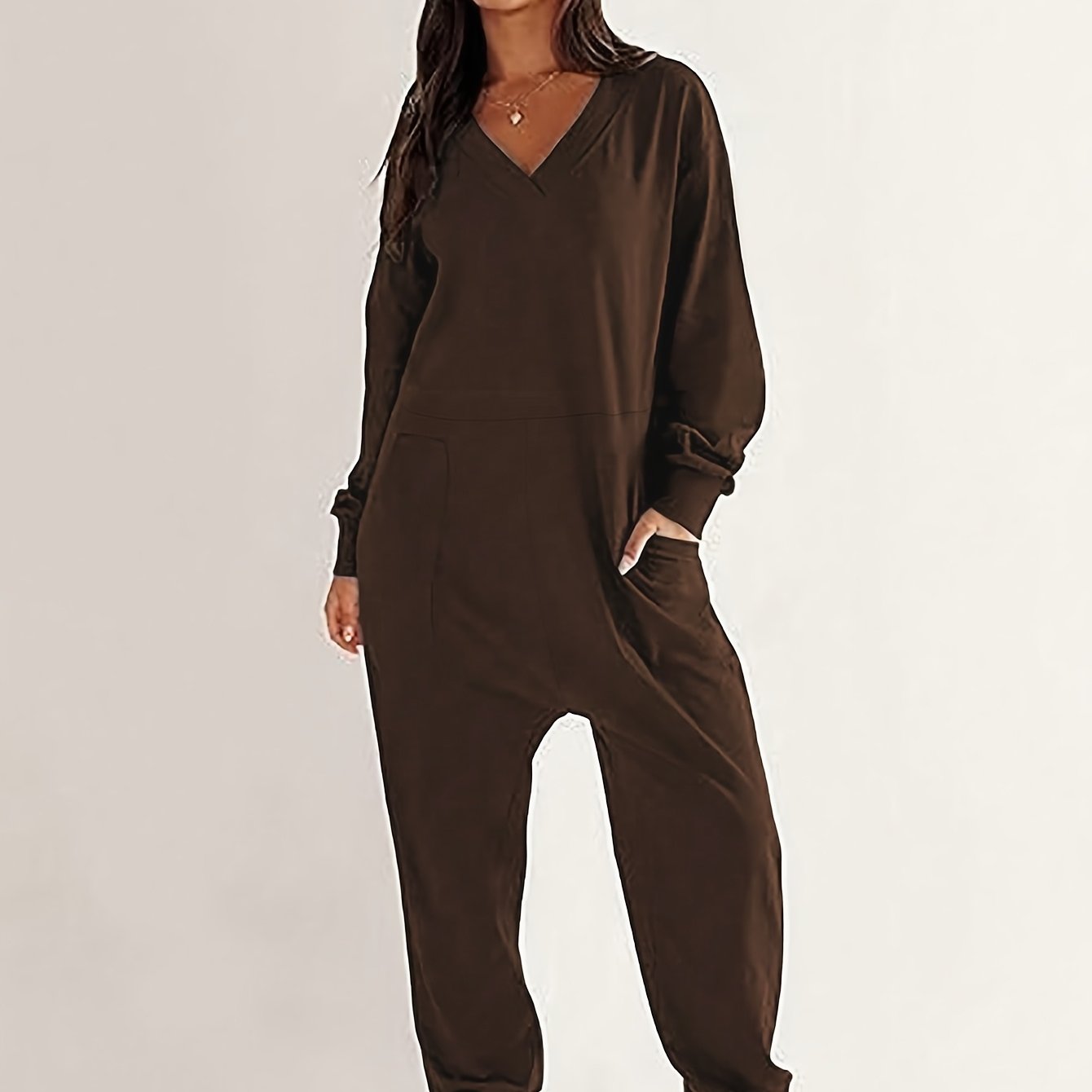 Mono sin mangas de talla grande para mujer con escote en V profundo y hombros caídos, color negro