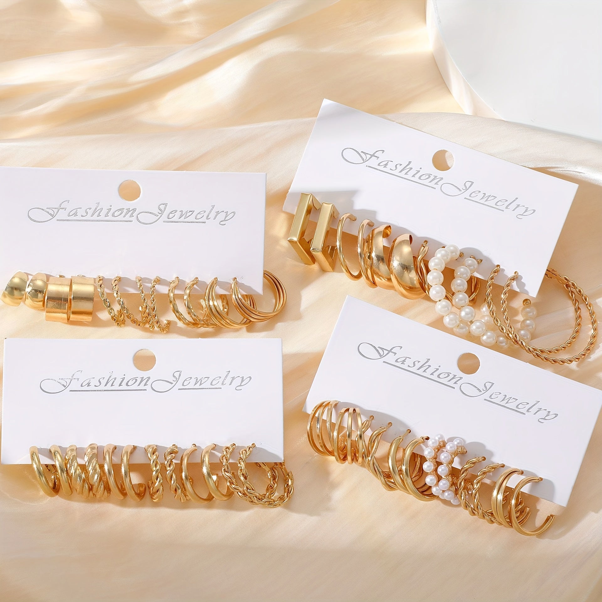 48 ta nafis va oddiy dizayndagi ayollar uchun doira shaklidagi ziraklar to'plami, sun'iy marvaridlar bilan bezatilgan. Har kuni kiyish uchun mukammal va ajoyib bayram sovg'asi bo'ladi.