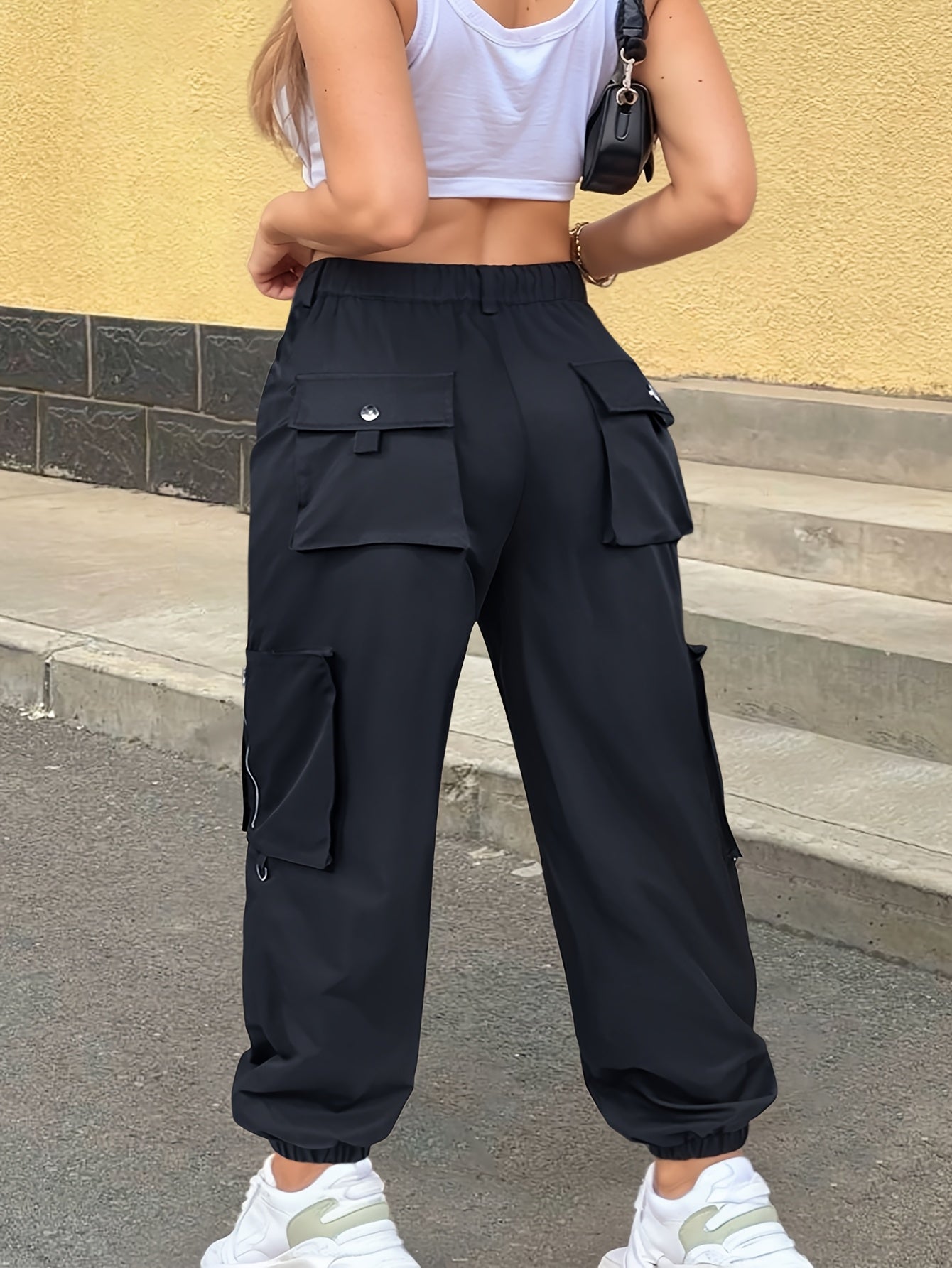 Ayollar uchun keng model polyester joggerlar, cho'ntaklar bilan, barcha mavsum uchun kundalik shimlar