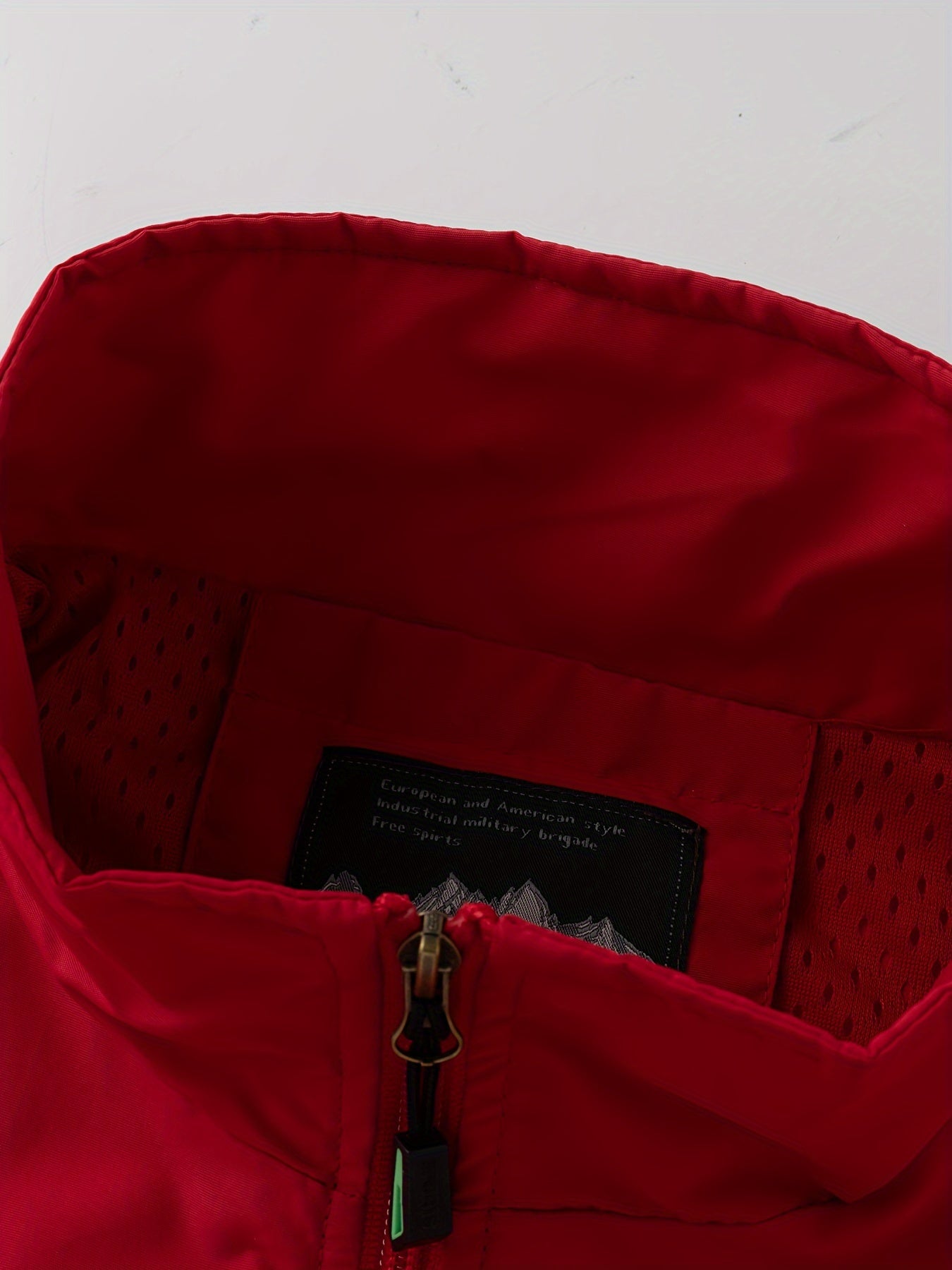 Men's Black Woven Polyester Sleeveless Vest with High Collar and Multiple Zipper Pockets for Outdoor Activities