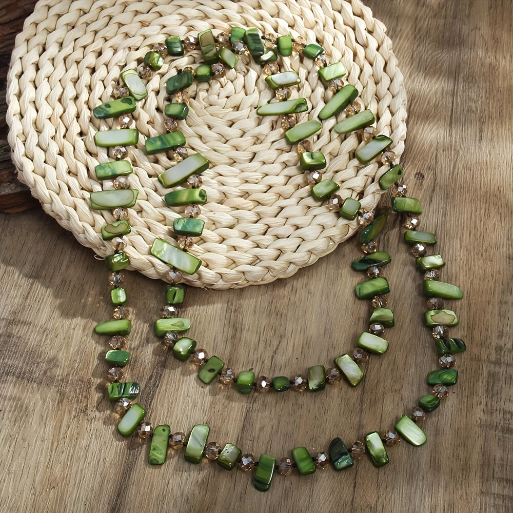 Kamalak kristallari va qobiq marjonlari bilan bezatilgan uzun tugilgan marjon - boho-chic, bohem uslubini sevuvchi ayollar uchun ideal sovg'a.