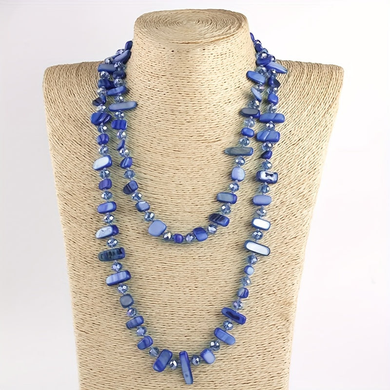 Kamalak kristallari va qobiq marjonlari bilan bezatilgan uzun tugilgan marjon - boho-chic, bohem uslubini sevuvchi ayollar uchun ideal sovg'a.