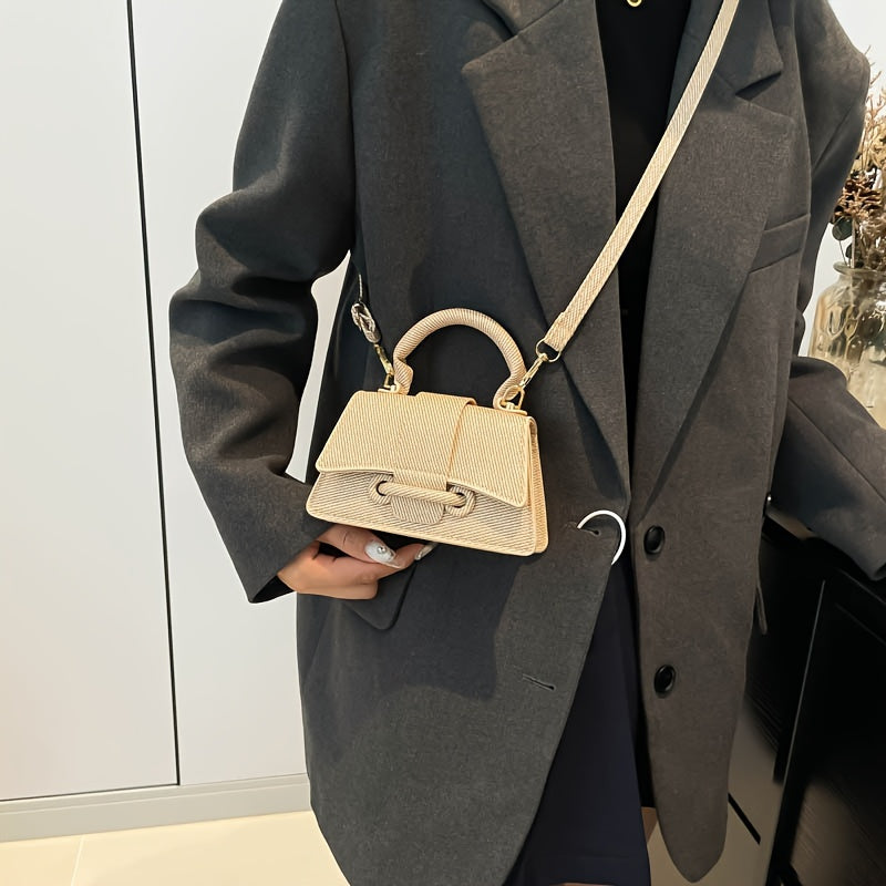 Kahaki, kulrang, pushti, yashil va och jigarrang ranglarda uslubiy mini crossbody sumka, sozlanadigan kamar, magnit yopish va astar bilan. Mustahkam rang, naqsh yoki bosma yo'q, chetlarini tugatish bilan.