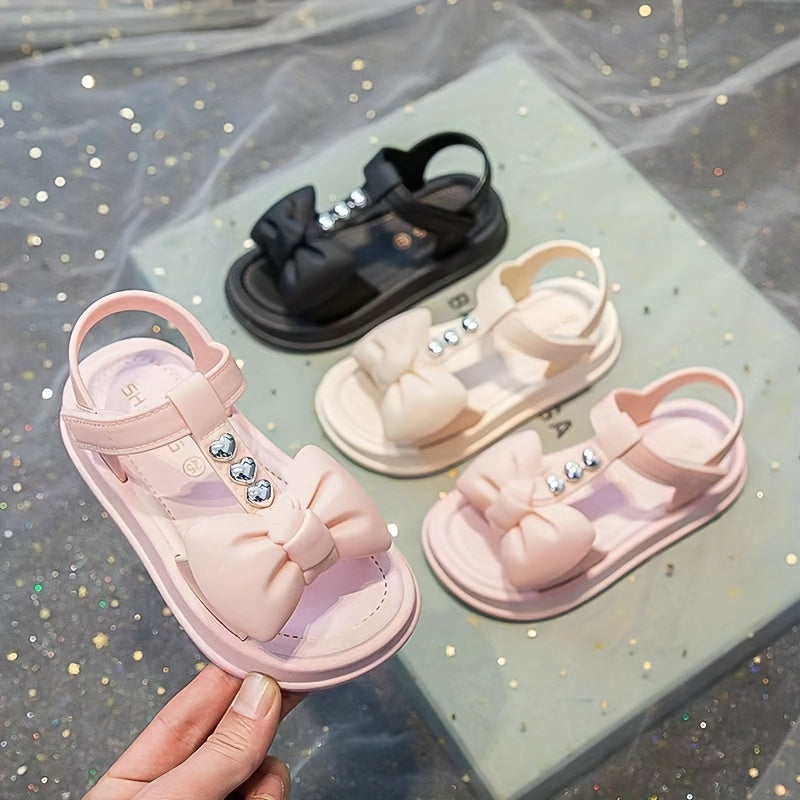 Girls Summer Sandals with Bow Accent Breathable PVC for Outdoor and Casual Wear in Black and Pink