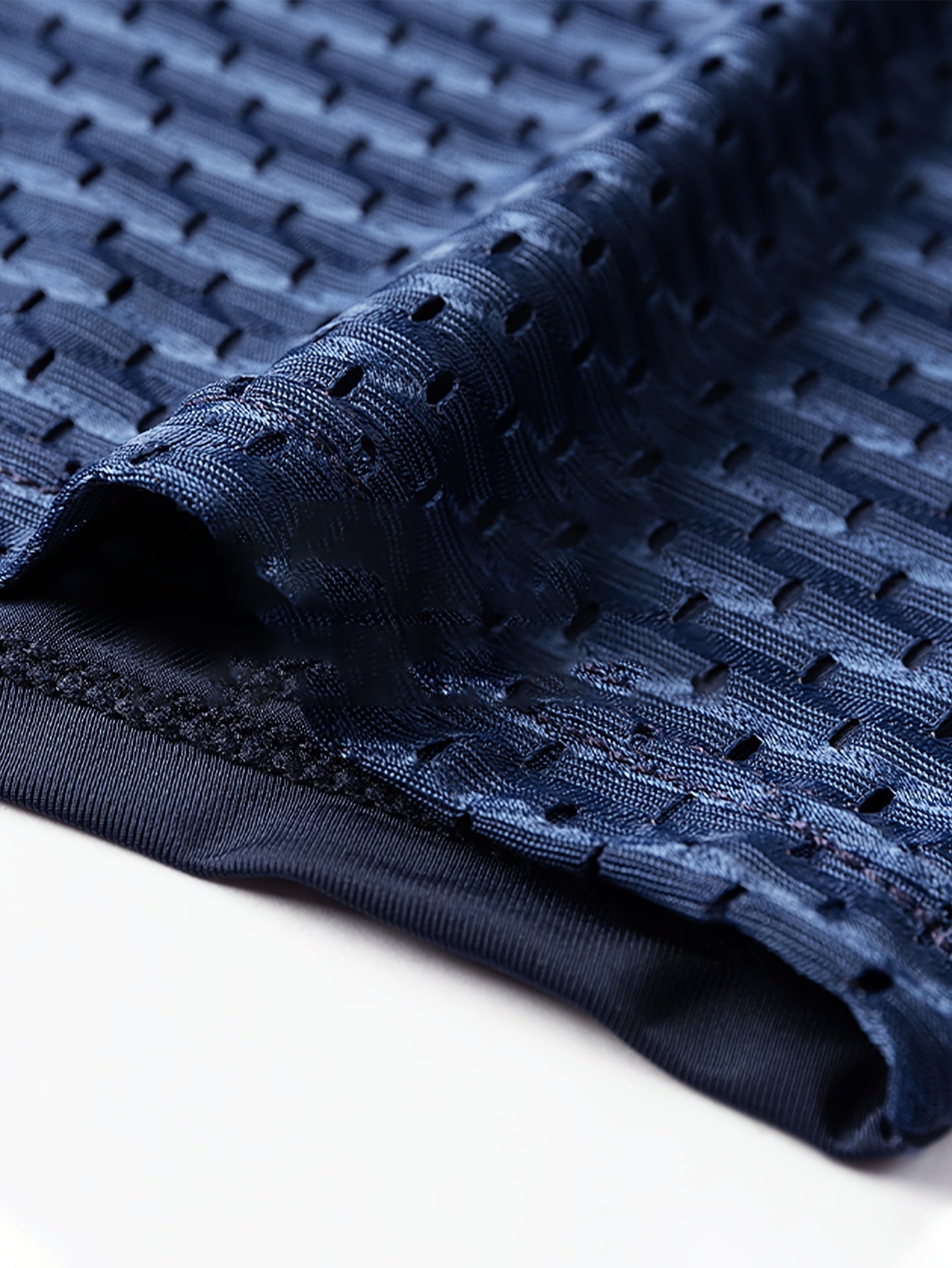 Set de 4 bóxers de malla transpirable para hombre, de color sólido semi-translúcido, con alto contenido de elastano en poliéster