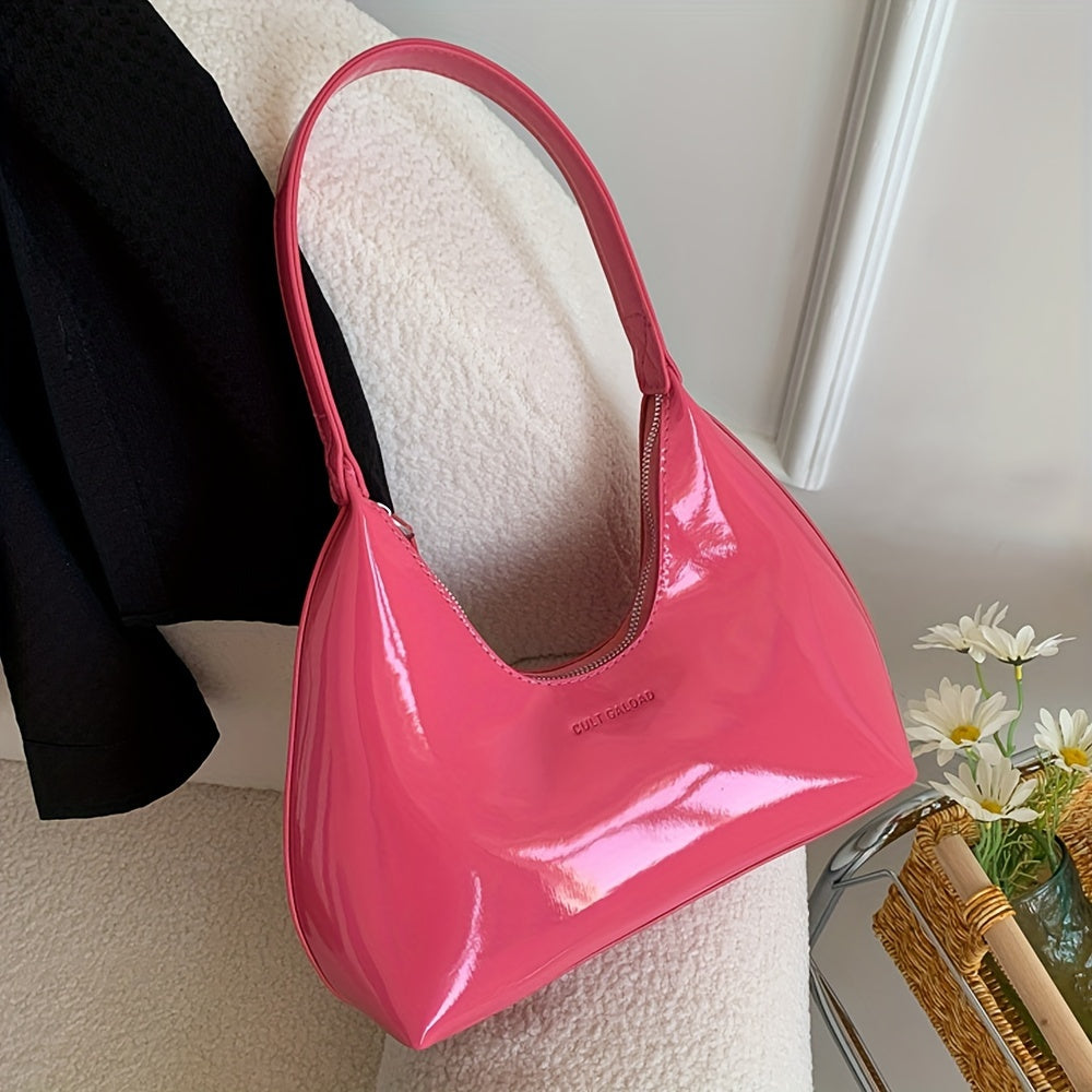 Шикарная красная сумка через плечо с глянцевой лакированной отделкой и застежкой на молнии, идеально подходящая для повседневного использования.