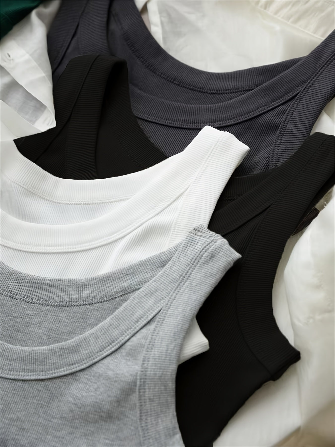 Juego de 4 camisetas de mujer con escote en U para primavera y verano, sin mangas, capa base