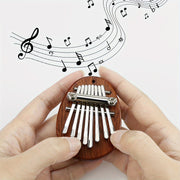 Mini Peach Wood Kalimba with 8 Keys and Storage Bag for Beginners and Music Lovers