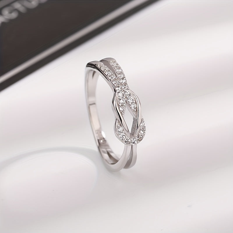 Anillo de plata de ley con diseño de nudo de zirconia para mujer joyería de compromiso y boda