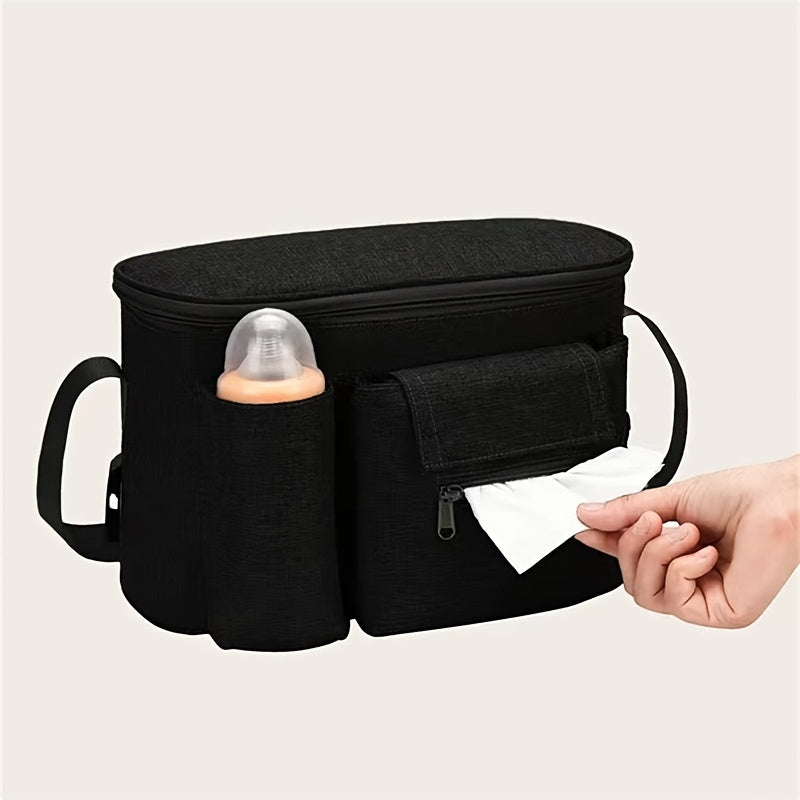 Katta sig‘imga ega, polyester materialdan tayyorlangan, ko‘p funksiyali, saqlash cho‘ntaklari va yelka tasmasi bilan jihozlangan mustahkam, zamonaviy aravachalar tashkilotchisi.