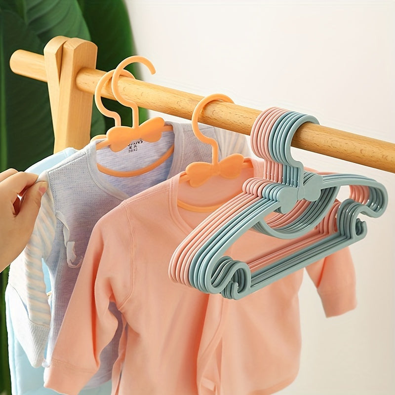 Newborn Baby Hangers Set of 10 Durable PP Material with Bow Storage for Children 0-10 Years