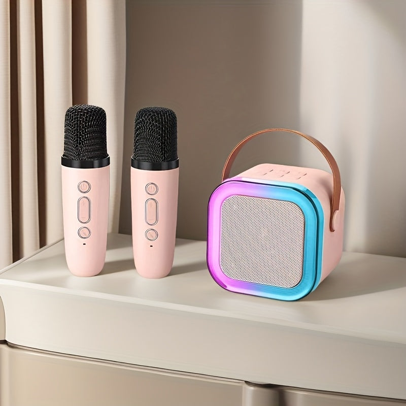 Ikki simsiz mikrofon va rangli chiroqlar bilan jihozlangan portativ karaoke dinamik, oilaviy tug'ilgan kunlar va ochiq havoda sayohatlar uchun ideal.