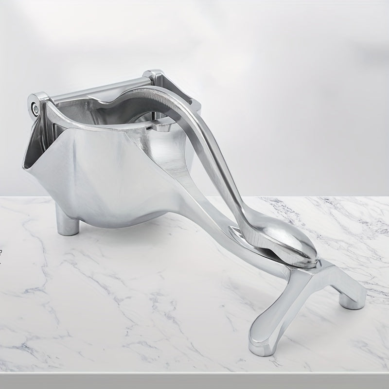 Extractor manual de frutas para la obtención de jugo fresco, compacto y fácil de usar