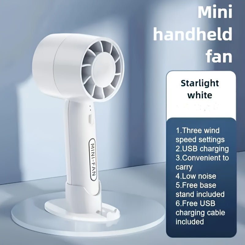 Portativ mini fan, USB bilan qayta zaryadlanadigan, 3 tezlik sozlamasi va asos standi bilan. Uy, ofis va ochiq sayohatlar uchun mos. Uchta rangda mavjud.