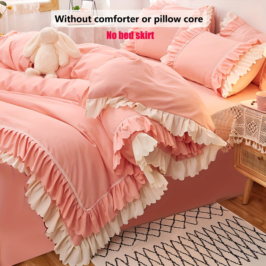 3 qismdan iborat pushti qirralangan to'shak to'plami 2 ta yostiq qopqog'i va 1 ta qopqoqni o'z ichiga oladi, to'ldiruvchi yoki qulaylik kiritilmagan.