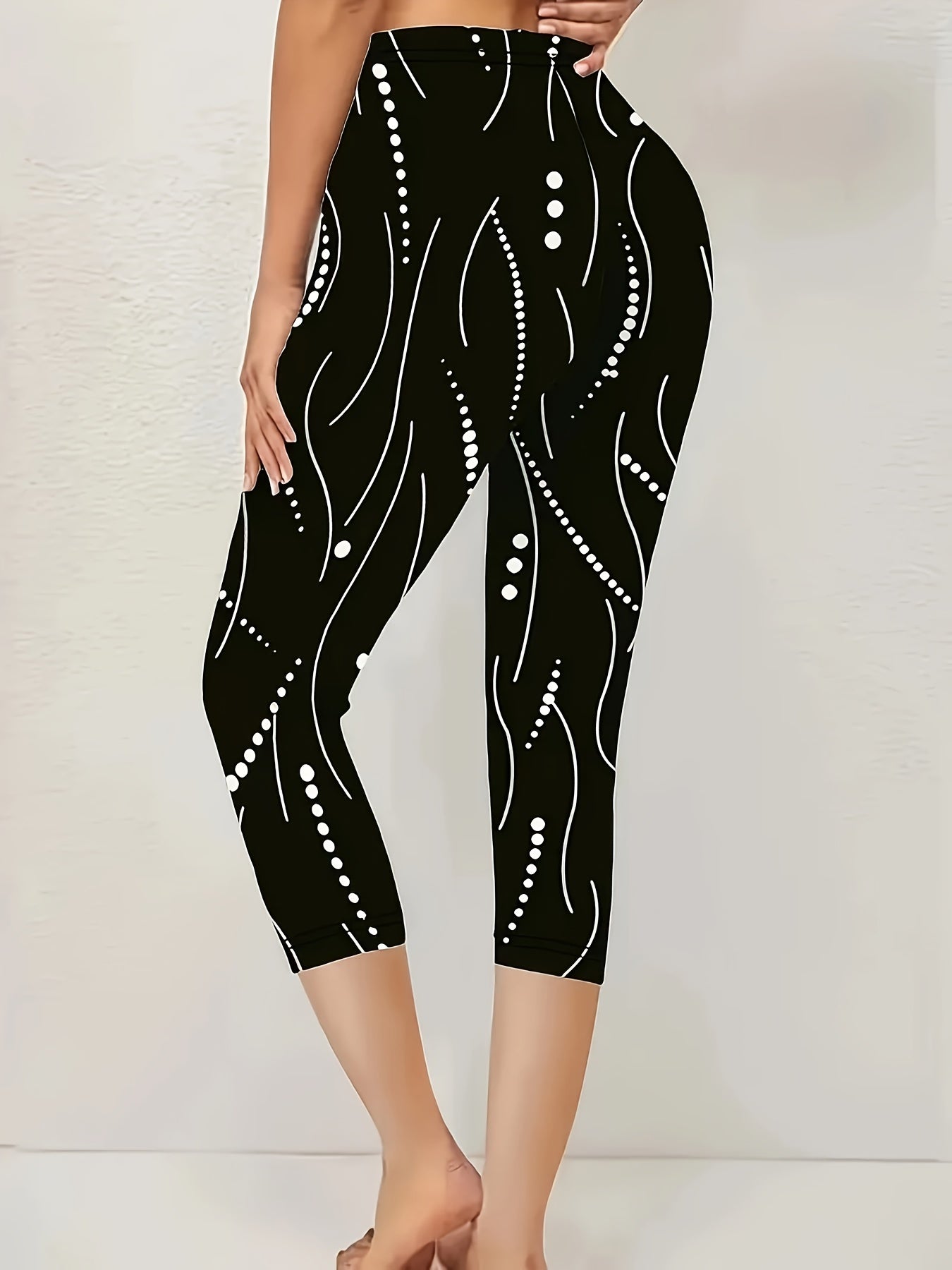 Women's Black and White Abstract Print Leggings with High Waist and Stretchy Fabric