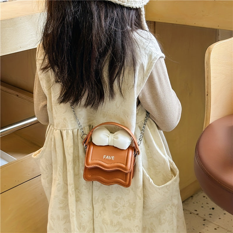Kids Girls Pink Crossbody Bag with Bow Accent and Embossed Flap for Daily Use