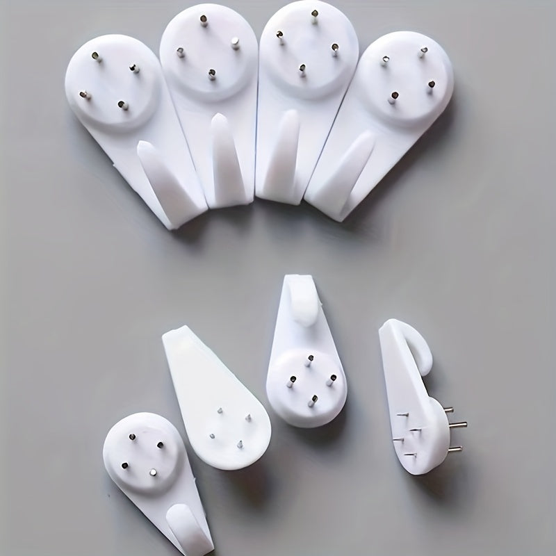 Rasm va bezaklarni osib qo‘yish uchun 10 ta ko‘rinmas plastmassa devor qoqichlari