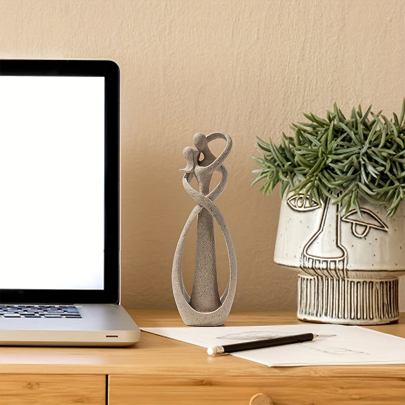 Modern uy yoki ofis dekoratsiyasi uchun abstrakt rezinadan qilingan o'pishayotgan juftlik haykali