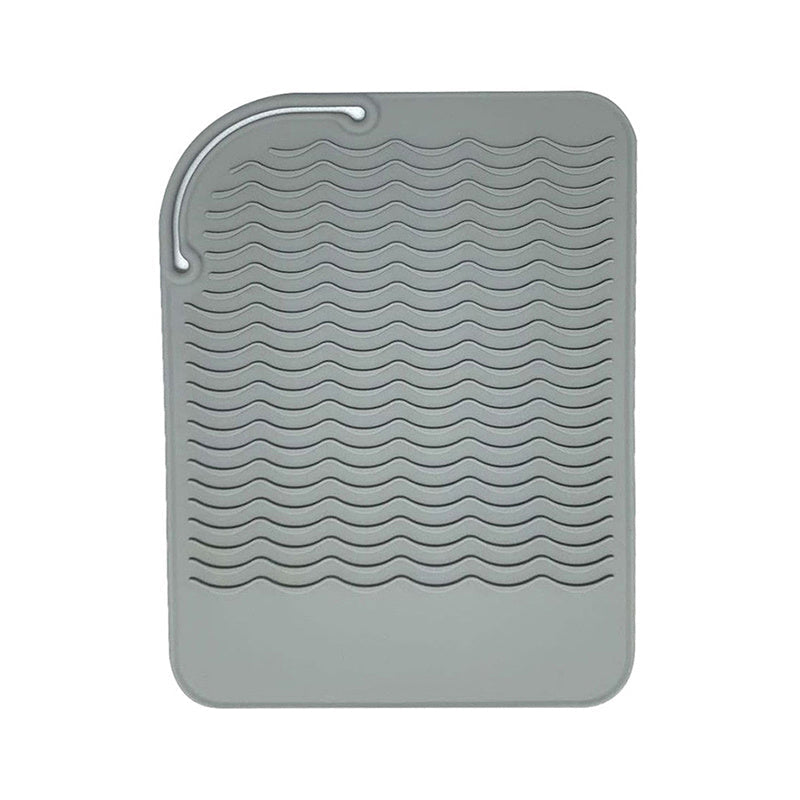 Issiqqa chidamli silikon mat - Mustahkam va qayta ishlatiladigan - Sirpanmaydigan himoya pad - Elektr energiyasi talab qilinmaydi - Sochni to'g'rilash, tekis temirlar va burama temirlar uchun ideal