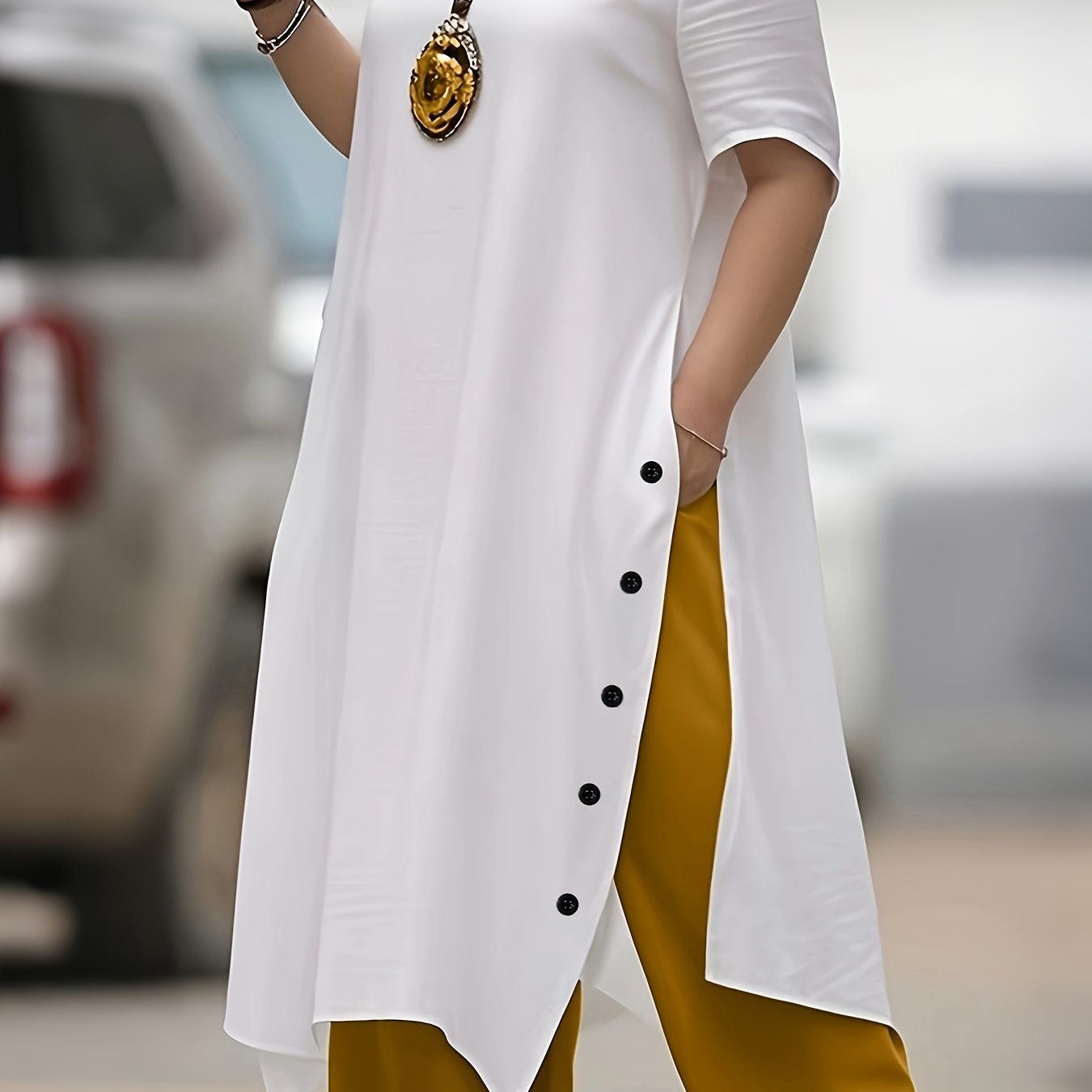 Women's Casual Vacation Top with Irregular Hem Button Accents and Color Block