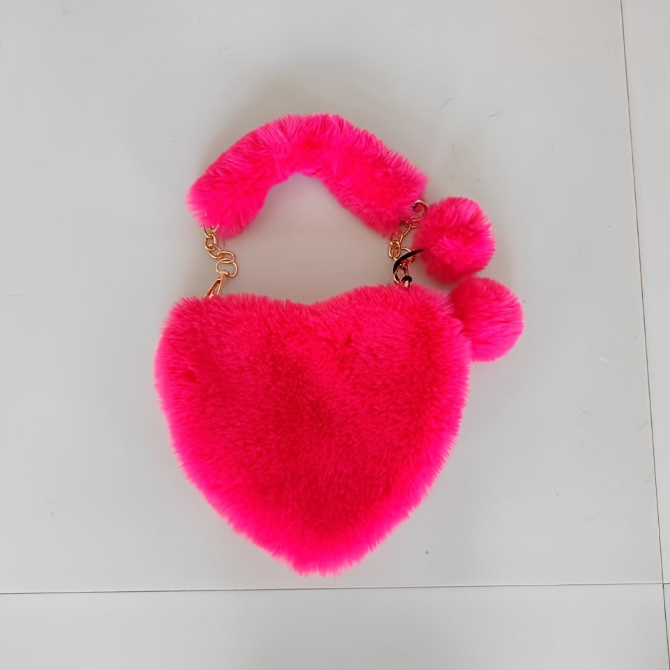 Yengil dizayndagi ajinli ayollar uchun plush yurak shaklidagi yelka sumkasi, ajratiladigan tasma va zip yopilishi bilan. Kundalik sayrlar, xaridlar va uchrashuvlar uchun mukammal. Yorqin pushti va boshqa ranglarda mavjud.