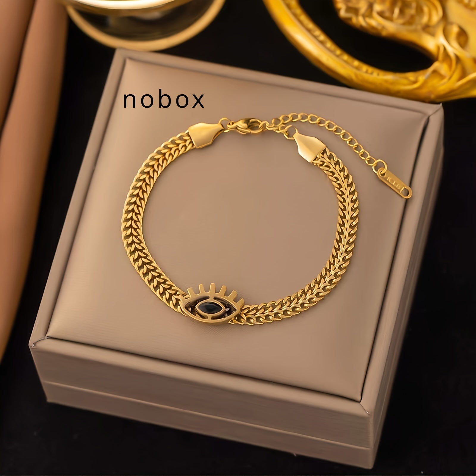 Golden Stainless Steel Hollow Eye Necklace and Bracelet Set for Women