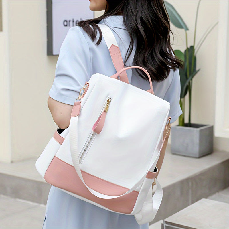 Стильный рюкзак против кражи для женщин, изготовленный из легкого, прочного нейлона с отделением для ноутбука. Доступен в розовом, синем и черном цветах.