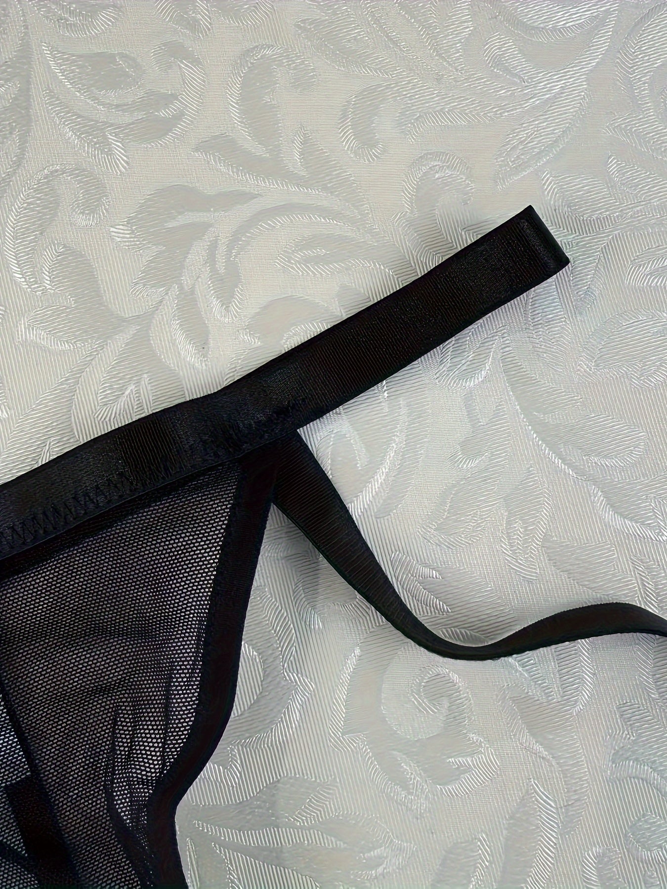 Conjunto de lencería de cinturilla con liguero y tanga de malla transparente para mujer