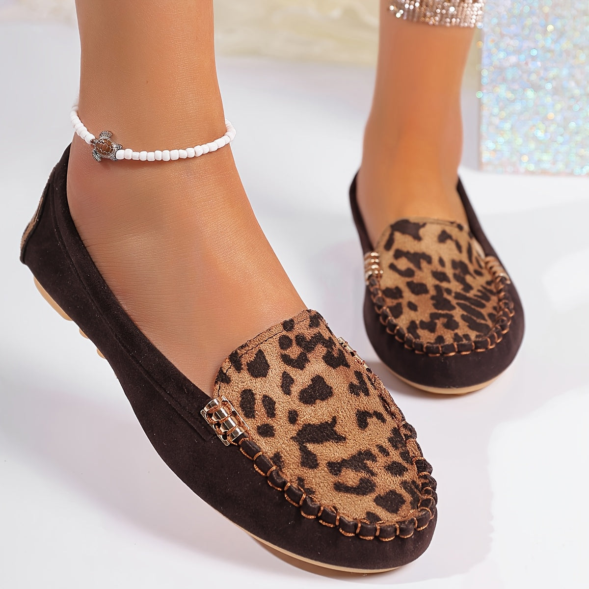 Women's Leopard Print Slip-On Flats with Rubber Sole and Metal Accents