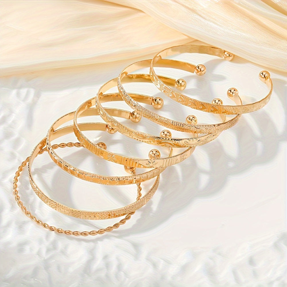 7 ta zamonaviy ayol bilaguzuklari to'plami, burama va yulduz naqshlari bilan, osonlik bilan shikarga ega dizayn, mozaika yoki qoplamasiz tayyorlangan, har qanday tadbir va har bir mavsum uchun mukammal, nafis ta'til uslubi bilan ko'rinishingizni oshiring.