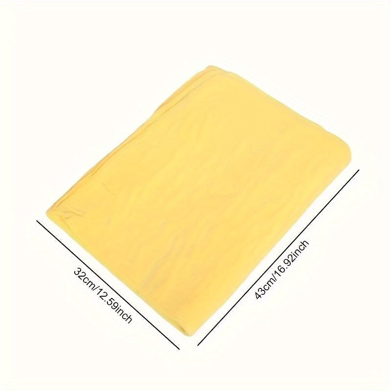 Супер впитывающее замшевое полотенце для быстрого и безцарапинного высушивания автомобиля.