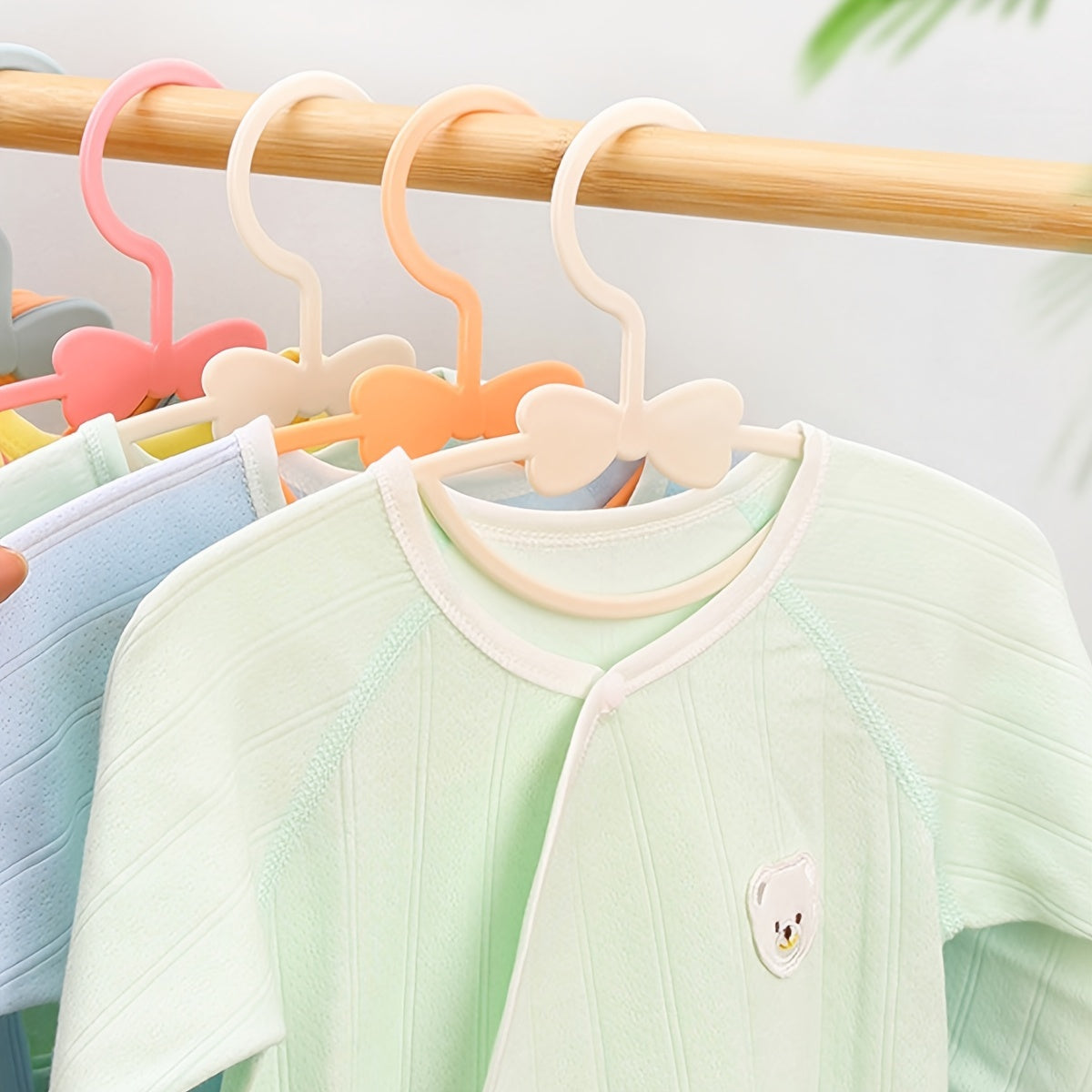 Set of 10 White Bowknot Clothes Hangers for Nursery and Home Organization