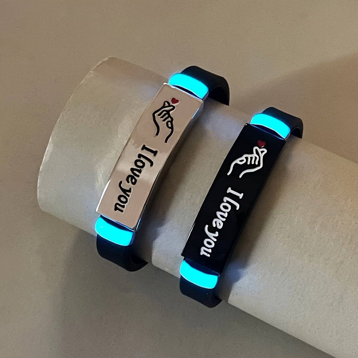 Pair of 2 Glow-in-the-Dark Silicone Couple Bracelets with Hand Heart Gesture
