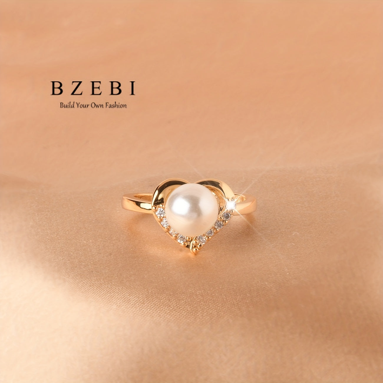 Set of Four Titanium and 18K Gold Plated Jewelry Pieces with Heart Design and Milky Stone