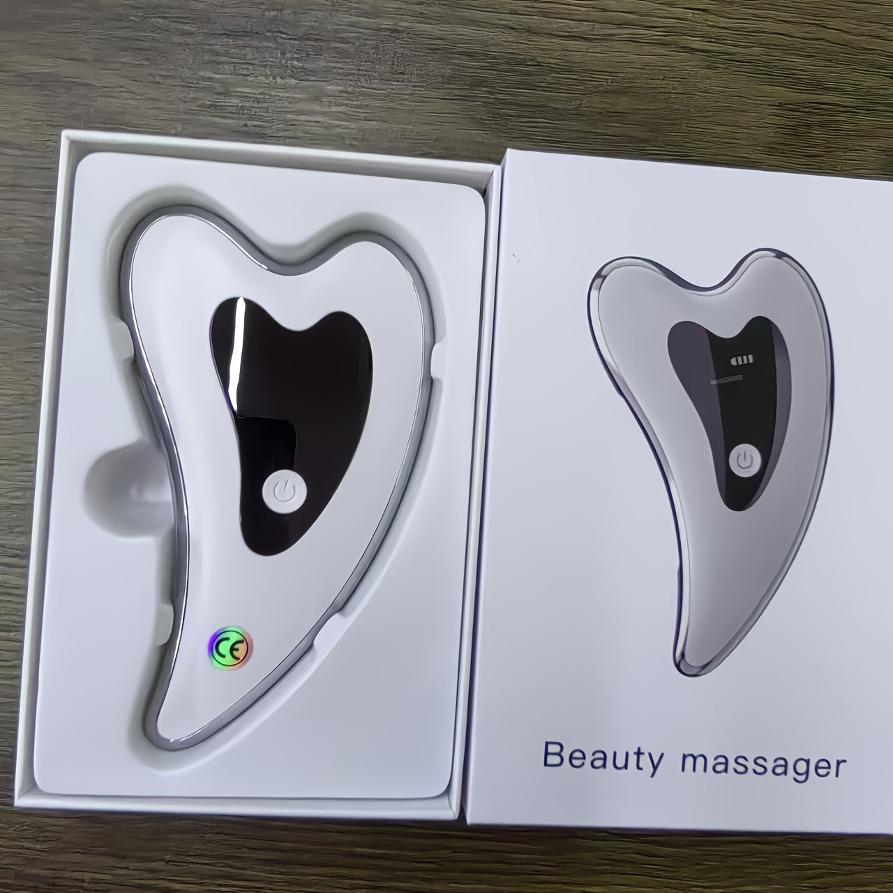 Masajeador facial eléctrico Gua Sha con calor, vibración y modo múltiple, recargable