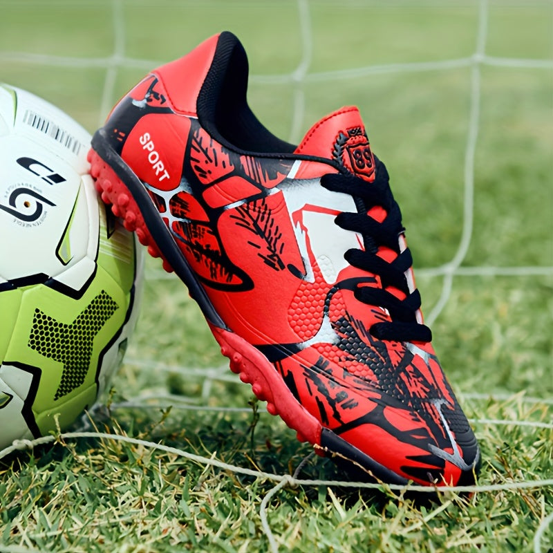 Qora va qizil rangdagi erkaklar yoshlar futbol to'pi, ip bilan bog'langan, gumus taglik, EVA ichki taglik. Mashg'ulotlar va tasodifiy o'yinlar uchun ideal. Ip bilan bog'langan to'p va gumus asosli futbol poyabzallari.