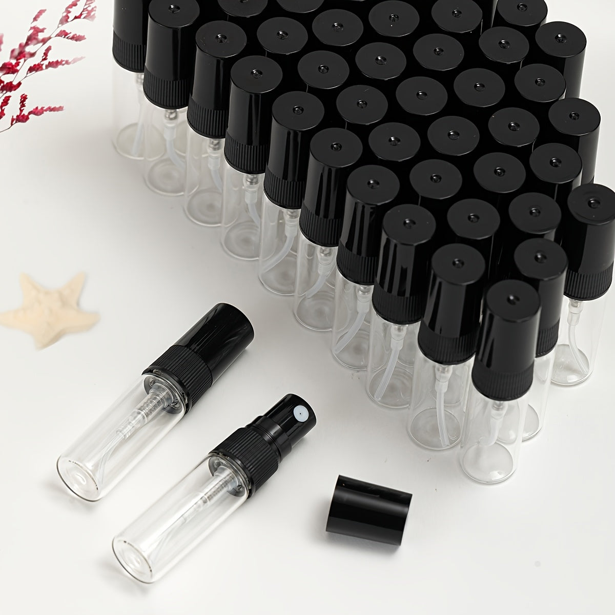 Set of 56 Refillable Glass Perfume Bottles with Spray Nozzles, Travel Size