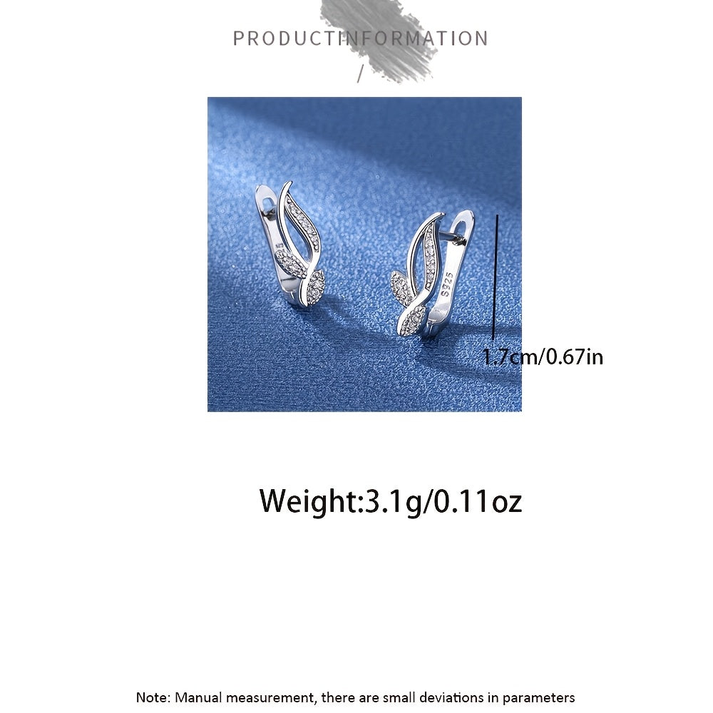 Zarif 925 sterling kumush bilakuzuklar, kichik zirkoniya o't dizayni bilan, har kuni kiyish va maxsus tadbirlar uchun mukammal. Taxminan 3.1 gramm og'irlikda.