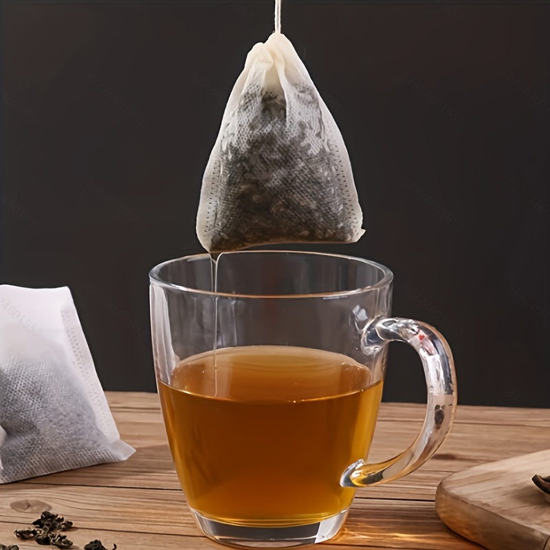 100 ta Bir martalik ishlatiladigan to'rva bo'lmagan filtr sumkalar, choy, o'tlar, ziravorlar va efir moylari uchun