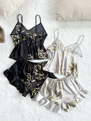 Conjunto de pijama de satén con estampado floral, top corto con escote en V y shorts con dobladillo de volantes