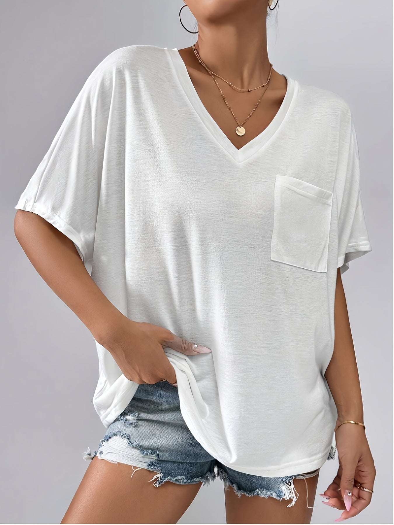 Camiseta de mujer blanca de manga corta con escote en V, casual y de corte suelto, top de verano