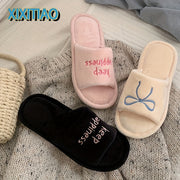 Women's Winter Slip-On Slippers Soft Fabric Indoor House Shoes in Black and Beige